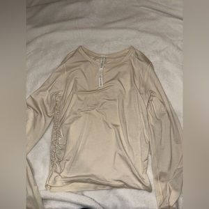 Lululemon Cropped Long Sleeve with Rouge Detailing on the sides